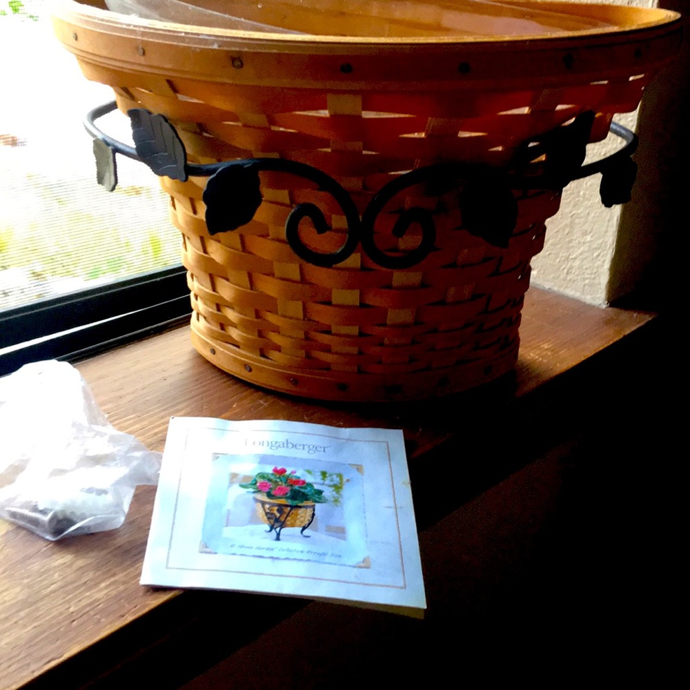 Longaberger Geranium Basket with wrought iron wall bracket plastic liner.